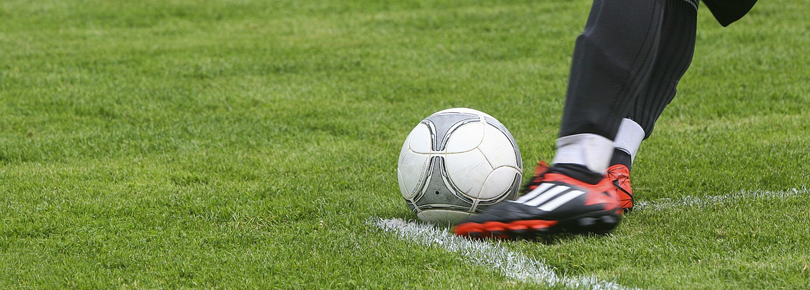Person som spelar fotboll.